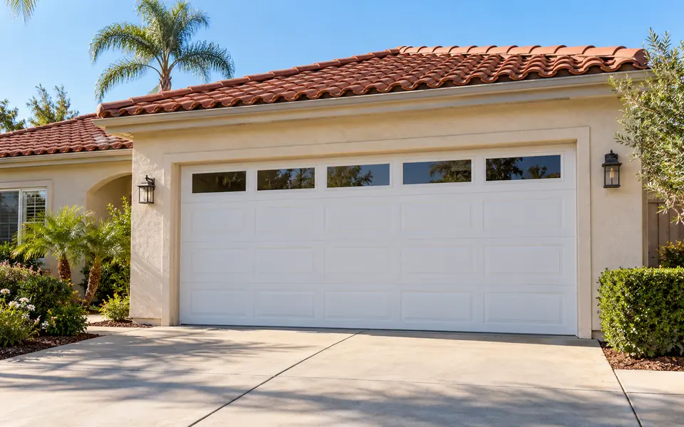 White sectional garage door on a California home